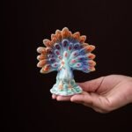 Handcrafted ceramic open-tail peacock tea pet main product view