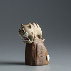 Cute chibi tiger ceramic tea pet with calligraphy base main product view
