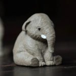 Side angle of elephant tea pet showing detailed texture and elephant trunk design