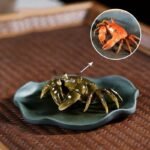 Dry state green purple clay crab tea pet on lotus tray, main product view