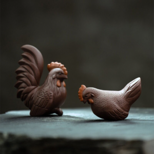 Main view of 2-piece handcrafted purple clay rooster and hen tea pet set