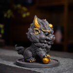 Cute Qilin Tea Pet with Base, Gold Accented Chinese Mythical Creature Figurine for Tea Ceremonies