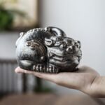Main view of handcrafted retro pixiu ceramic tea pet with antique bronze finish