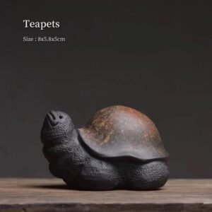 Main view of handcrafted Yixing purple clay turtle tea pet, showing full lifelike turtle shape with natural shell texture