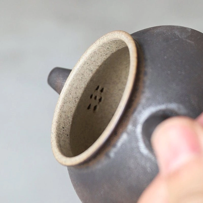 top view of 100ml vintage chinese gongfu ceramic teapot showing built-in internal filter