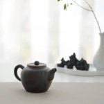front view of 110ml antique style rough clay chinese teapot