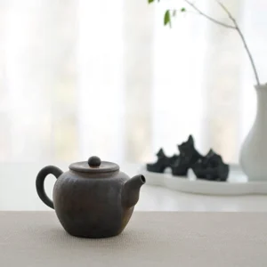 front view of 110ml antique style rough clay chinese teapot