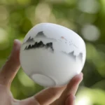 150ml hand painted ink landscape Chinese white porcelain tea cup main view