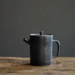 full front view of 150ml vintage black ceramic teapot with built in infuser