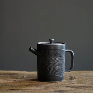 full front view of 150ml vintage black ceramic teapot with built in infuser