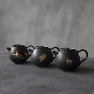 full view of 180ml matte black ceramic tea infuser pot with gold pattern
