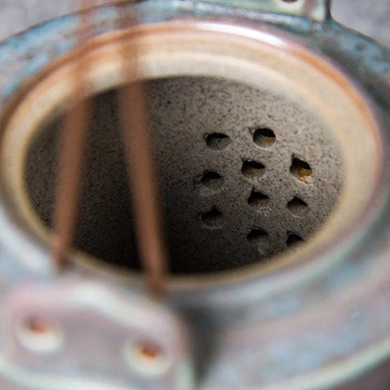 spout and built-in filter detail of small 180ml ceramic crane teapot