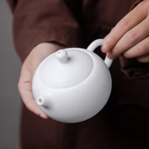 front view of 200ml creamy mutton fat jade white ceramic gongfu teapot