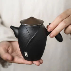 full view of matte black 230ml wandering hero ceramic tea pot