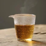 250ml frosted textured glass gong dao bei tea pitcher on plain white background