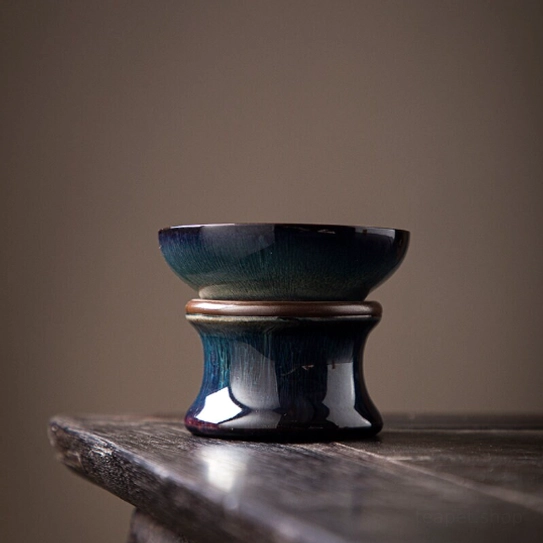 angle view showing the depth of the ceramic tea strainer bowl