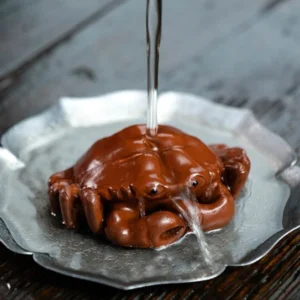 Main view of handcrafted authentic Yixing zisha crab tea pet on wooden tea tray