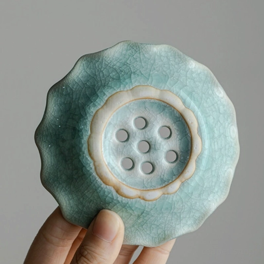 drainage holes on the base of ceramic lotus loose leaf tea strainer