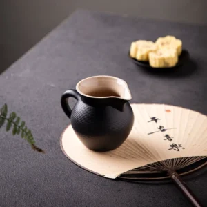 200ml black ceramic gong dao bei tea pitcher side view