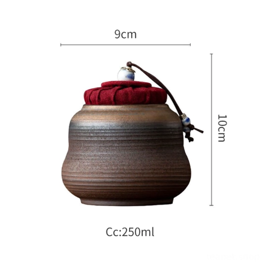 Side view of textured brown ceramic tea storage jar