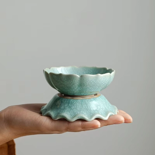 front view of handcrafted crackle glaze ceramic lotus loose leaf tea strainer