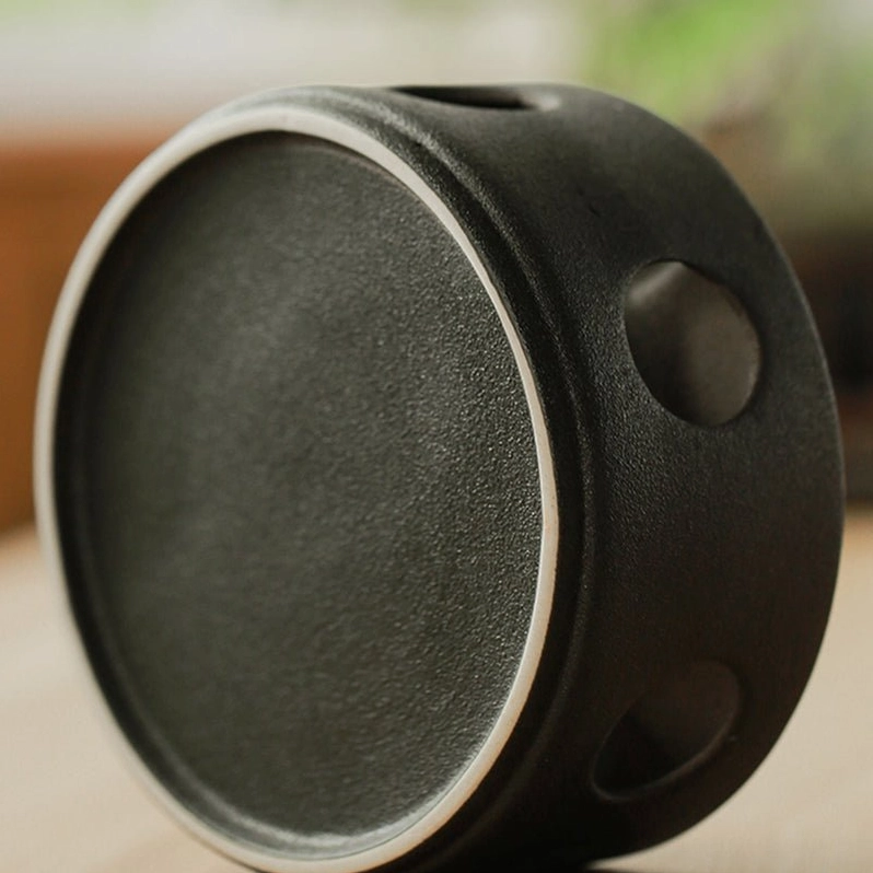 Ceramic mountain teapot displayed as home decor on living room coffee table