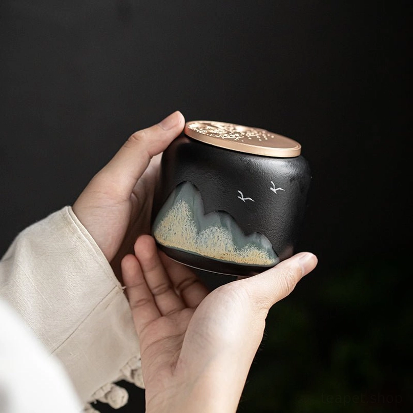 Ceramic tea jar placed on a wooden tea table as a decorative accent