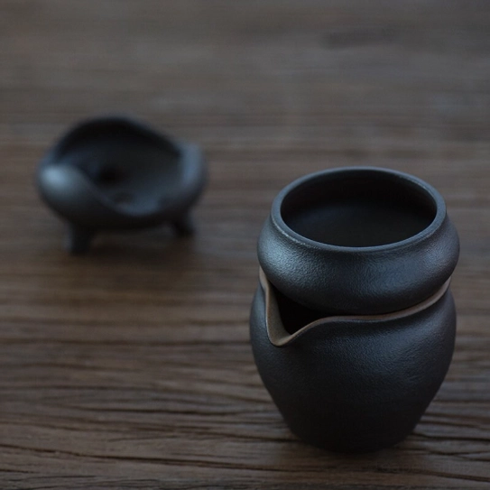 close up of the matte texture on black ceramic loose leaf tea strainer