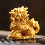 color changing golden qilin tea pet on gongfu tea table