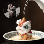 color changing lucky lion dance tea pet on tea table