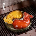 color changing ox tea pet set of 2 with yin yang display base