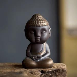 Main view of handcrafted cute Q-version purple clay smiling Buddha tea pet