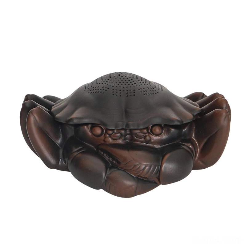 detached crab shell tea strainer showing fine mesh holes
