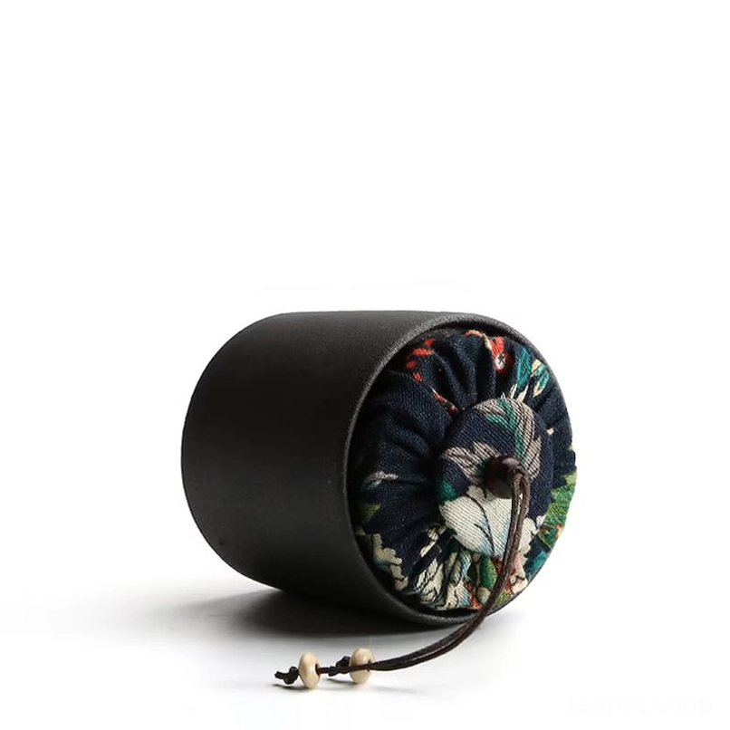 drawstring fabric lid detail with wood bead on mini tea jar