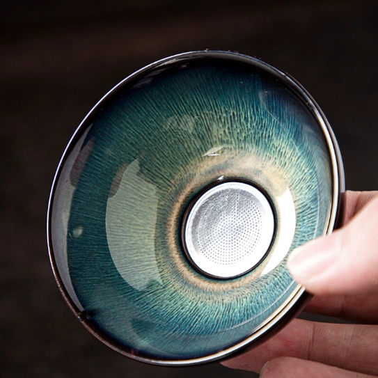 close up of fine stainless steel mesh inside the jian ware tea strainer