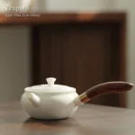 full side view of 180ml white porcelain kyusu teapot with wood handle