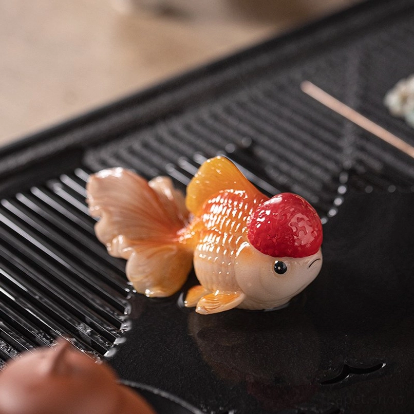 Color changing goldfish tea pet vibrant activated state after pouring hot tea