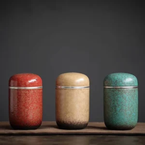 green textured ceramic tea jar with metal screw lid