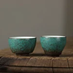 green crackle glaze porcelain tea cup side view