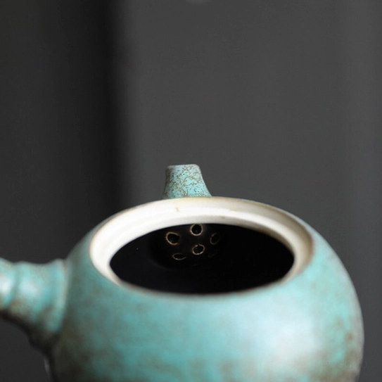 Built-in strainer filter inside green ceramic Kyusu Teapot