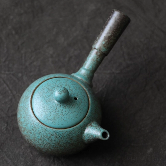 Close up of lid vent on green side handle Kyusu Teapot