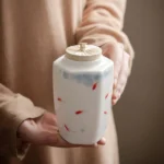 Hand-painted koi fish ceramic tea jar collection