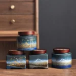Full collection of hand-painted ceramic tea jars with wooden lids in four styles