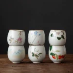 Collection of all 6 styles of hand painted Chinese ceramic tea cups with gold rim