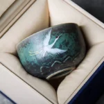 Full view of hand painted lotus crane ceramic chawan tea bowl