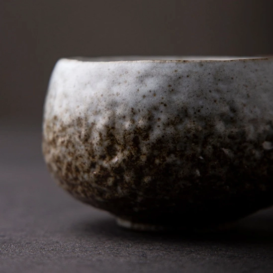 Side profile of hand-textured vintage chawan tea bowl