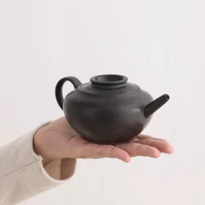 front view of handcrafted 200ml black ceramic gongfu teapot