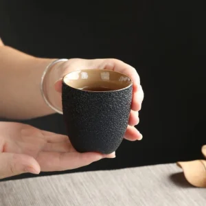 handcrafted black clay tripod tea cup 150ml side view