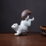 Handcrafted ceramic squirrel tea pet main view on wooden tea table