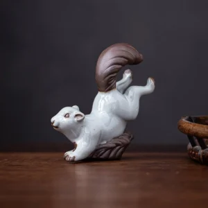 Handcrafted ceramic squirrel tea pet main view on wooden tea table